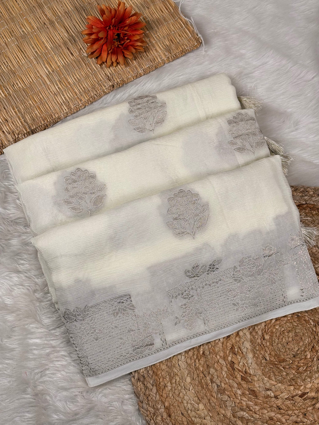 Chinon silk brings a lightweight elegance to traditional Banarasi weaving.