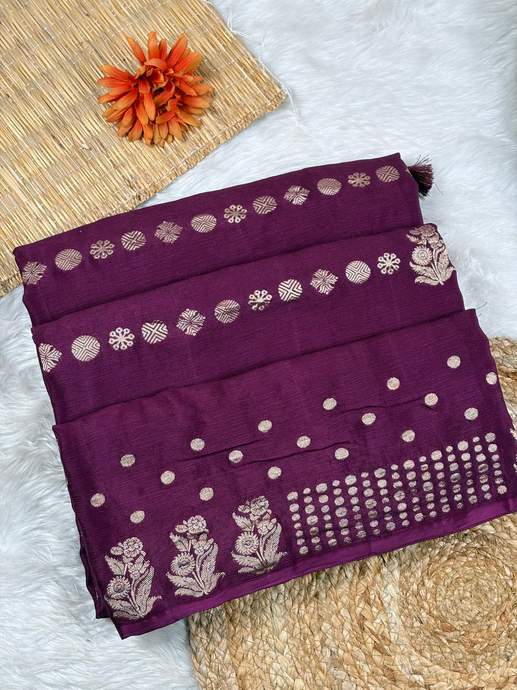 Chinon Silk Banarasi Saree, a modern take on the timeless classic. Crafted from luxurious chinon silk, this saree combines the opulent aesthetic of Banarasi weaving with contemporary ease and fluidity.